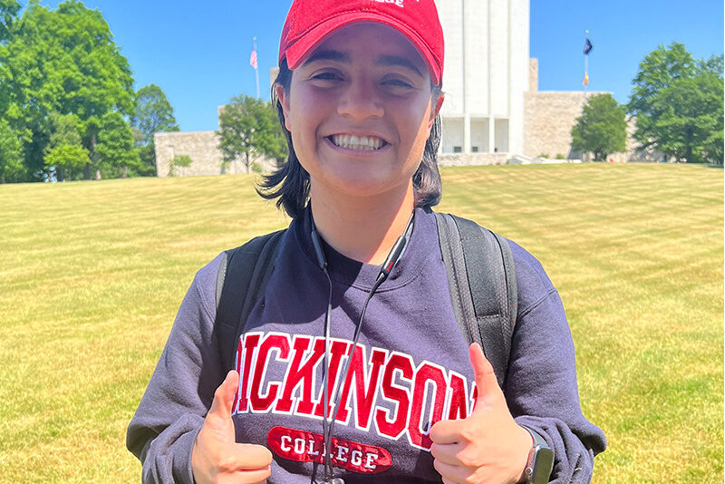 Milton Hershey School student stands with a Dickinson College sweatshirt on.