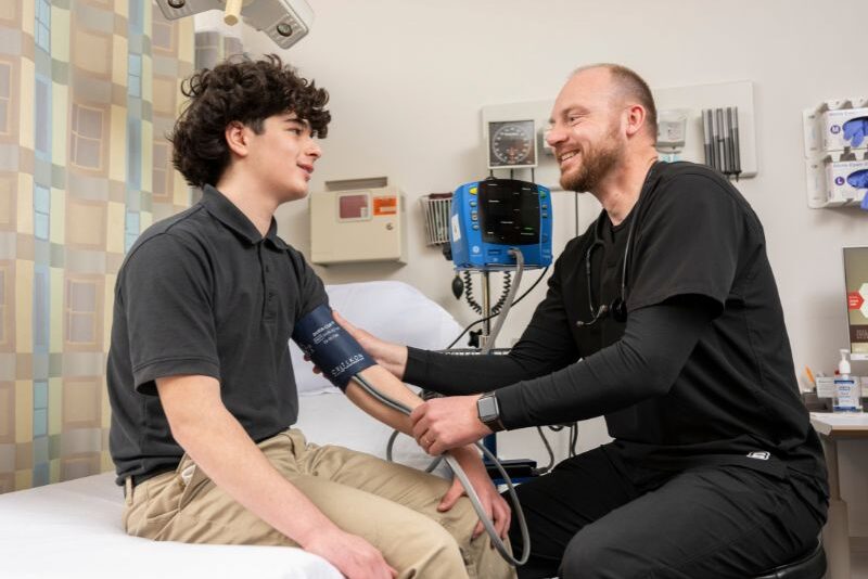 MHS SD student Jonathan Lewis with nurse Joseph Tibbals