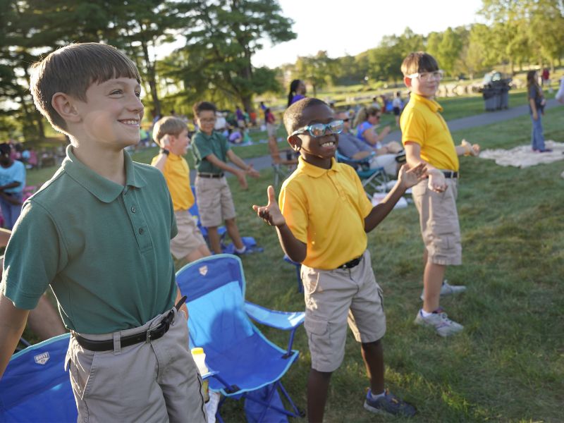 Milton Hershey School special chapel event with Blessing Offor and male students participating.