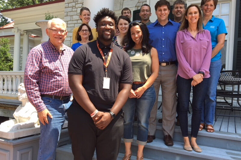 Stanford Maison '19, front, poses with The Hershey Trust staff on the last day of his internship.