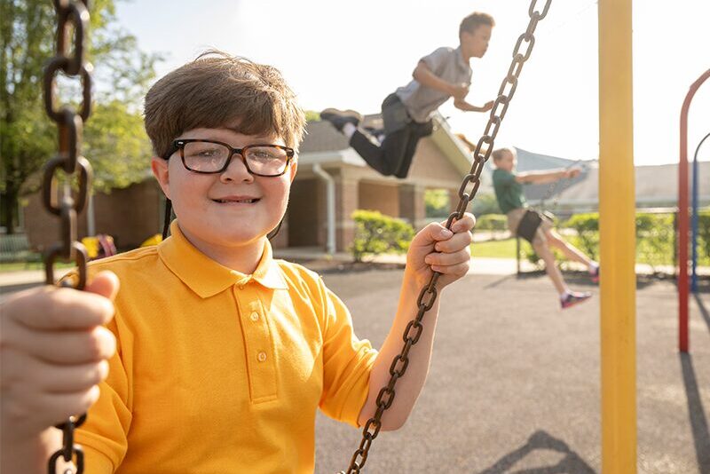 Elementary students playing on the playground
