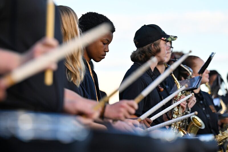 Students playing instruments