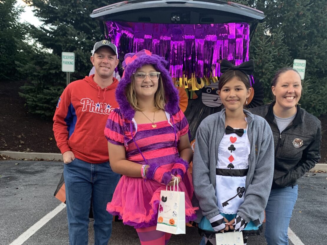 MHS student home Rose Garden with Project Fellowship group participate in Trunk or Treat