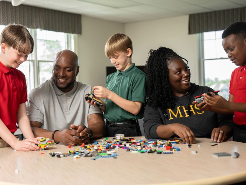 MD houseparents Lester and kia Mickel with their male students