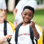 Milton Hershey School student giving thumbs up at Opening of School Celebration