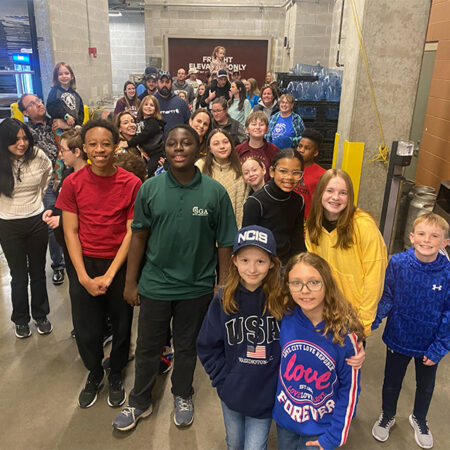 Milton Hershey School students attend Hershey Bears game to see their jersey design in action.