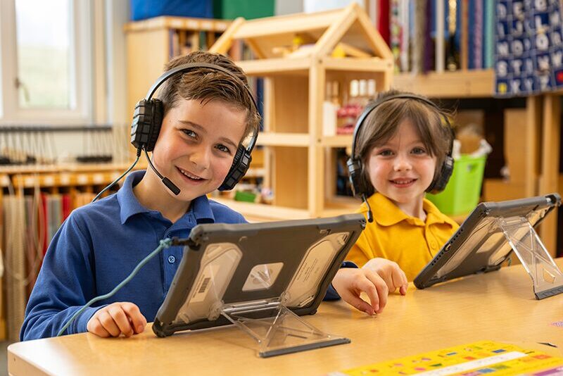 Students learning through technology in elementary school
