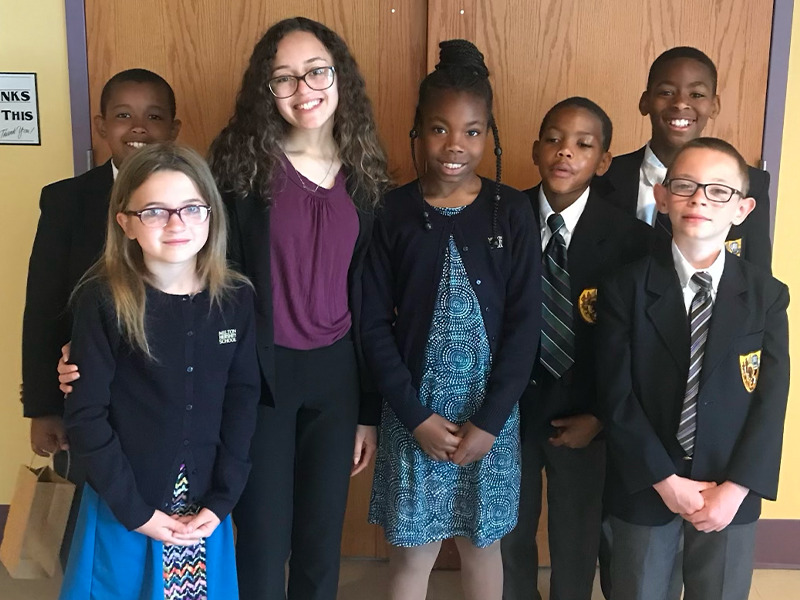 Thalia Vega ’19 stands with young Milton Hershey Schools students she mentored through Junior Chapel.