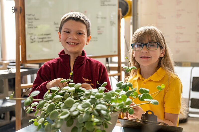 Elementary students in greenhouse.