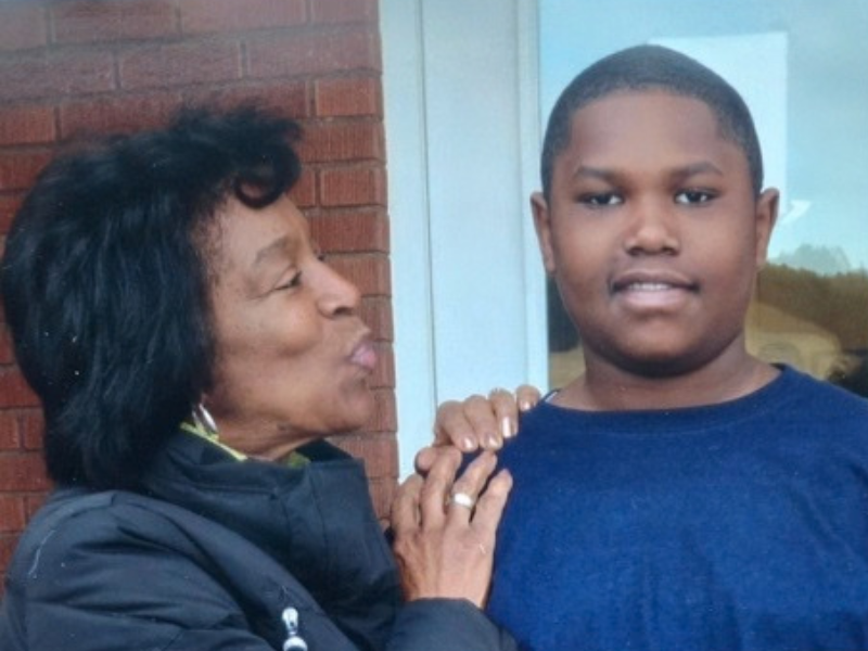 MHS alumnus Xavier Oliver '18 as a child with family member