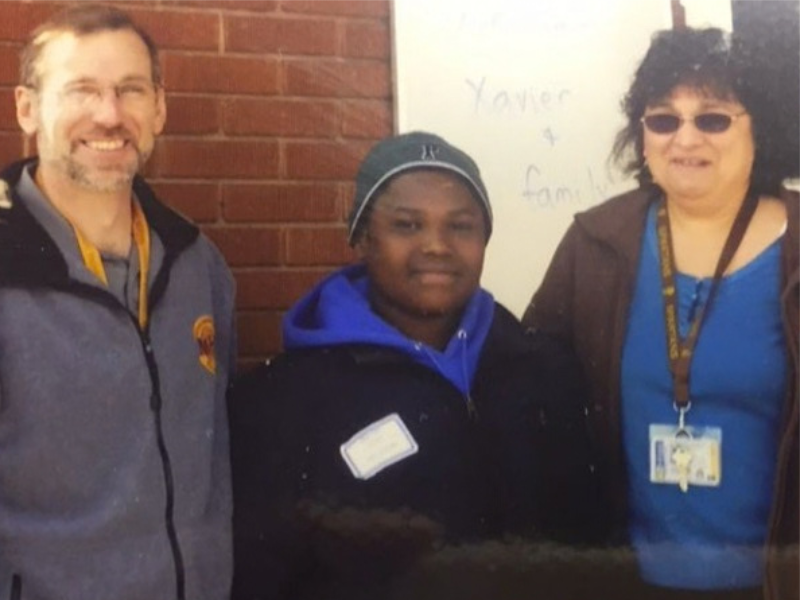 MHS alumnus Xavier Oliver '18 with houseparents