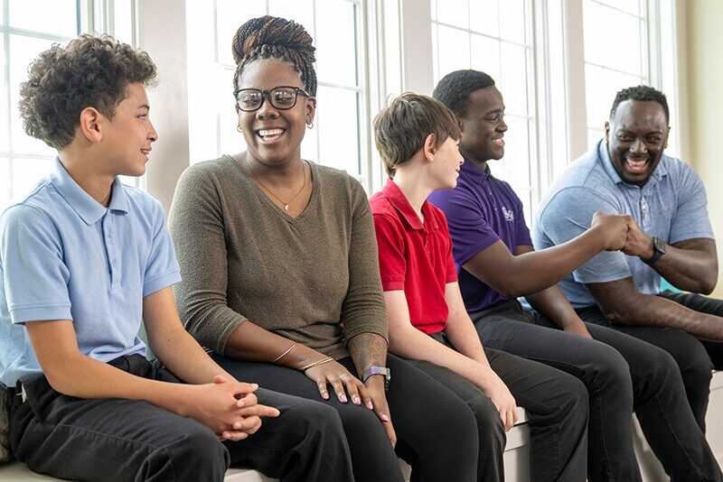 Middle school boys with their houseparents