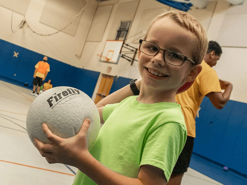 Milton Hershey School students play dodgeball during summer YRE.
