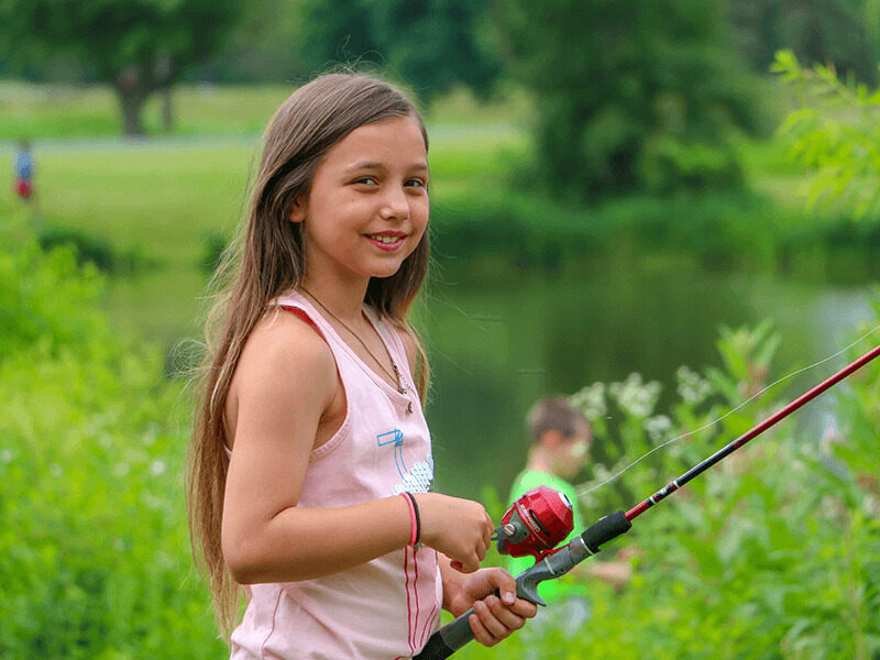 Milton Hershey School students fish on campus during summer YRE.