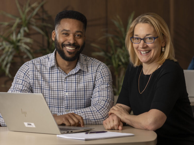 professionals at MHS meeting to review a presentation
