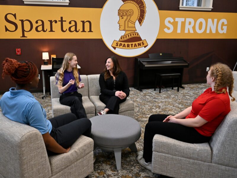 transitional living assistant with her students